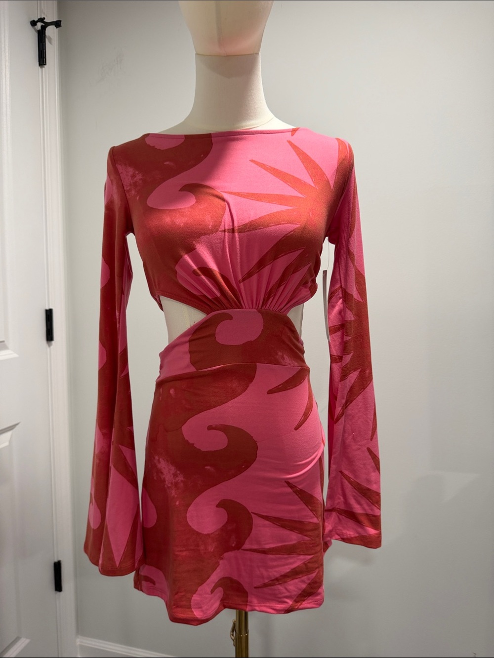 NWT Urban Outfitters Cutout Long-Sleeve Mini Dress in Pink/Red floral design.